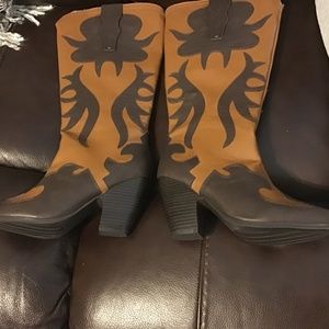 Ladies leather two tone tall over calf boots.